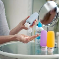 TRVLMORE Silicone Reisflesjes - Navulbaar - Handbagage - 100 ML - 3 Stuks - Oranje/Paars/Blauw -Lichaamsverzorging Winkel 1200x1200 697